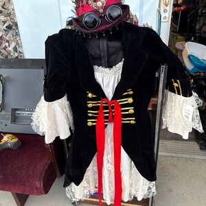 Elegant Black and White Asymmetrical Dress with Red Accents